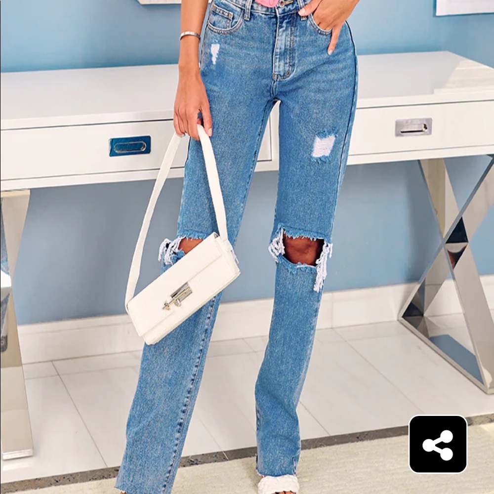 Vintage Wash High Rise Ripped Straight leg Jeans